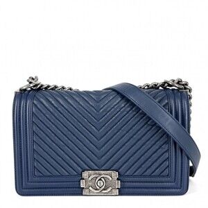 Chanel shoulder bag for women, featuring the Coco Mark, Boy design, chain str...